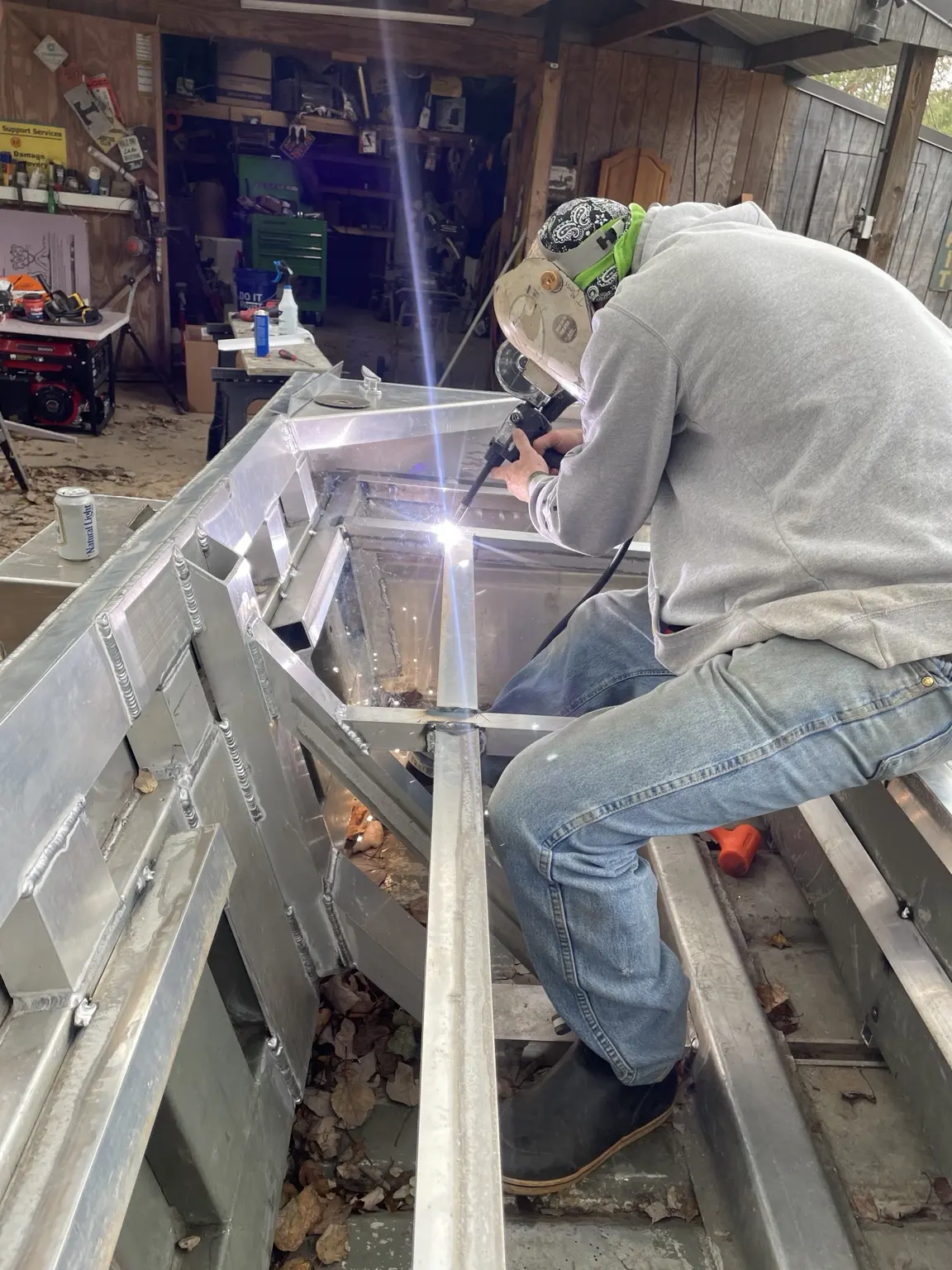 Aluminum boat modification being TIG welded