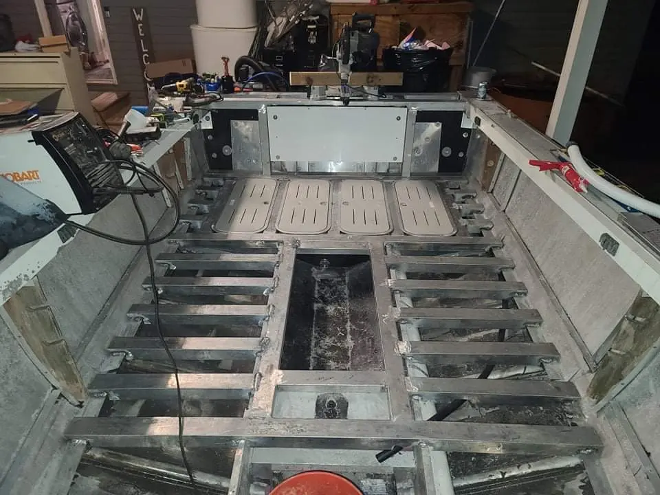 Custom aluminum boat structural refloor and framing in progress